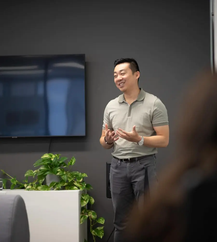 A Motiv team member presenting venture work to colleagues